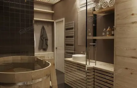 Современная баня с деревянной отделкой, печью с камнями и стеклянной перегородкой